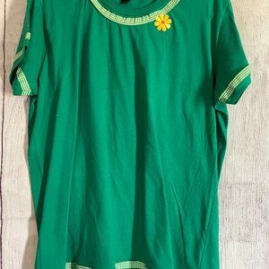 216 scoop neck tee with plaid ribbon and floral patch accents - hip slit